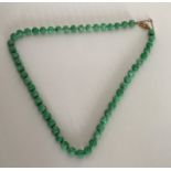 A good carved jade string of beads with high carat