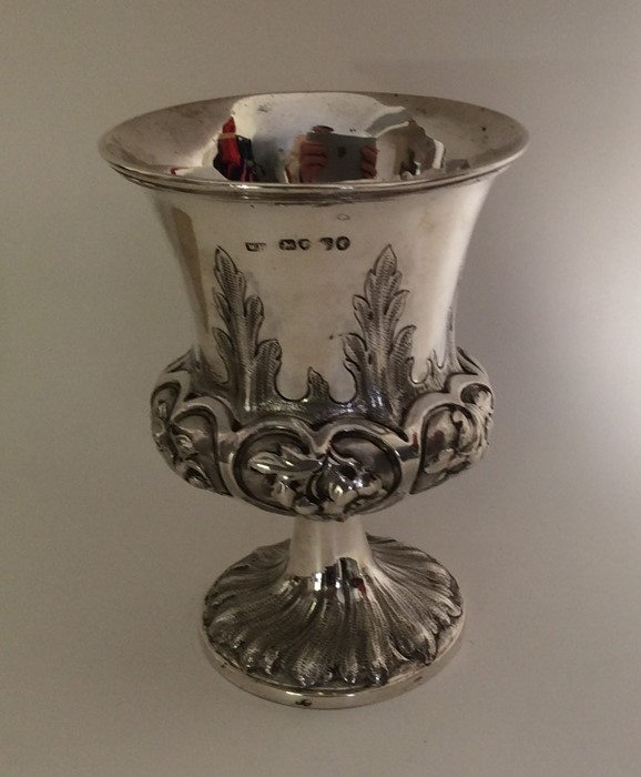 A Victorian silver campana shaped goblet decorated