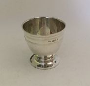 An unusual stylish engine turned silver egg cup. B