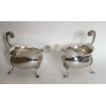 A good pair of Georgian silver sauce boats with ca