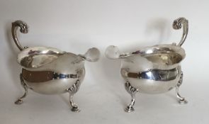 A good pair of Georgian silver sauce boats with ca