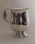An Edwardian silver christening cup with a 'Man In
