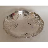 A stylish silver pierced dish with shaped edge. Sh