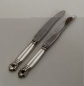 GEORG JENSEN: A pair of silver mounted knives with