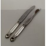 GEORG JENSEN: A pair of silver mounted knives with