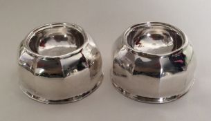 A pair of George I decagonal silver trencher salts