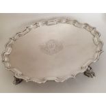 A good George II silver salver with crested centre