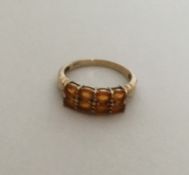 A two row gold gem set ring. Approx. 2.8 grams. Es