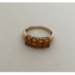 A two row gold gem set ring. Approx. 2.8 grams. Es