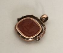 A large oval spinning fob with crested intaglio de