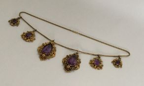 An attractive Victorian amethyst drop necklace wit