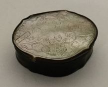 A shaped Georgian MOP and tortoiseshell snuff box