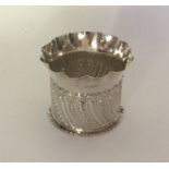 A circular half fluted silver plant pot with crimp