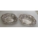 A good pair of chased silver bonbon dishes. London