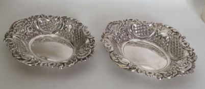 A good pair of chased silver bonbon dishes. London