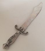 A large Continental silver sword with textured han