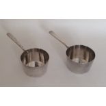 A pair of miniature silver plated saucepans. By Hu
