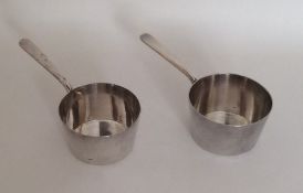 A pair of miniature silver plated saucepans. By Hu