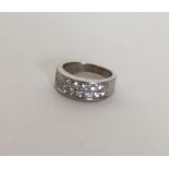 An 18 carat gold diamond two row ring. Approx. 6 g
