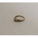 A small diamond circular cluster ring with floral
