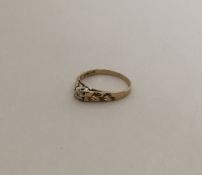 A small diamond circular cluster ring with floral
