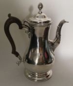 A good quality Georgian silver baluster shaped cof