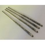 Two pairs of Chinese silver chopsticks decorated w