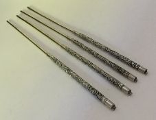 Two pairs of Chinese silver chopsticks decorated w