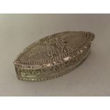 An oval boat shaped dressing table box with crimpe