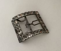 A Georgian silver mounted paste buckle with steel