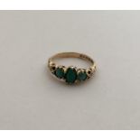 A 9 carat three stone turquoise ring. Approx. 2.2