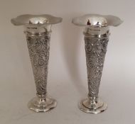 A good pair of silver embossed vases. Sheffield 1