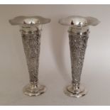 A good pair of silver embossed vases. Sheffield 1