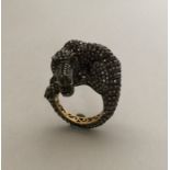 A large unusual gold ring in the form of an alliga