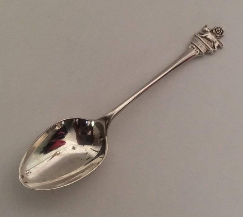 An unusual Edwardian silver souvenir spoon mounted