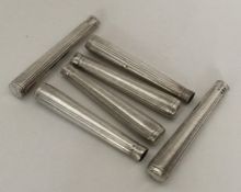 A heavy set of six silver fluted knife handles of