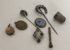 A silver thimble together with a Scottish brooch e