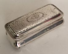 An Edwardian silver hinged top box with hammered d