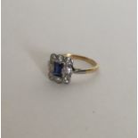 An attractive diamond and sapphire rectangular clu