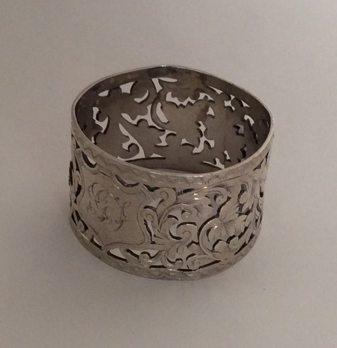 A pierced silver napkin ring. Birmingham. By TB. A