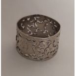 A pierced silver napkin ring. Birmingham. By TB. A