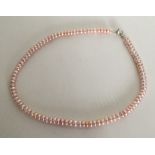 A silver mounted pearl necklace. Approx. 31 grams.