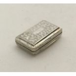 A heavy stylish rectangular silver vinaigrette wit