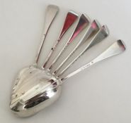 A heavy set of six rat tail tablespoons with crest