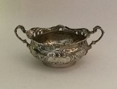 A good quality miniature silver two handled cup wi