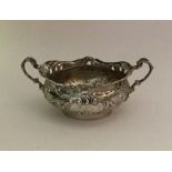 A good quality miniature silver two handled cup wi