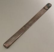 A stylish silver letter opener in the form of a kn