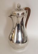 A good Georgian silver baluster shaped jug with ca