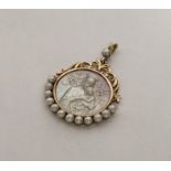 An attractive pearl and MOP pendant depicting a re