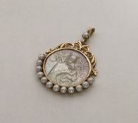 An attractive pearl and MOP pendant depicting a re